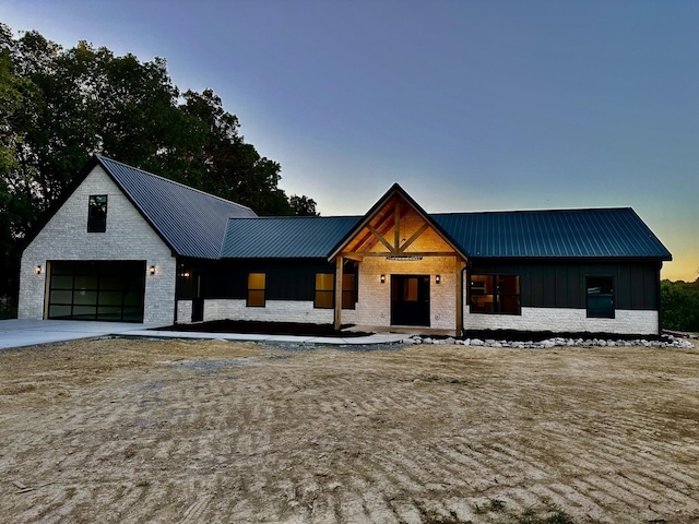 modern farmhouse with a garage