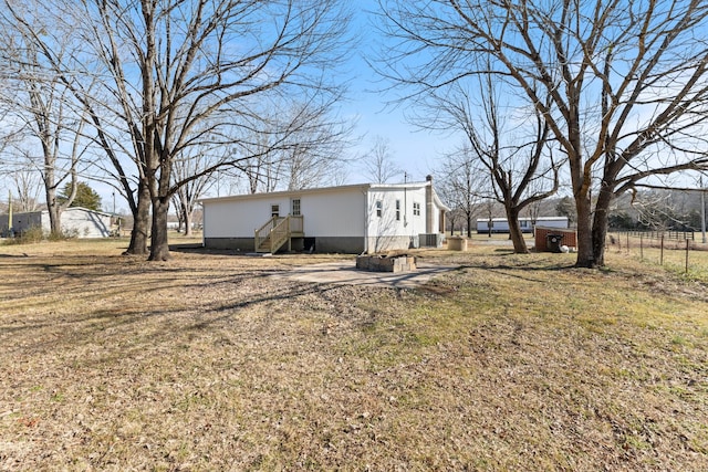 view of yard featuring central AC unit