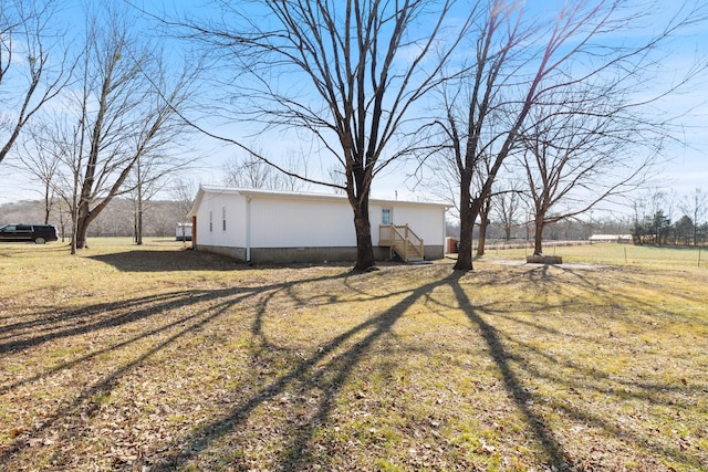 exterior space with a yard