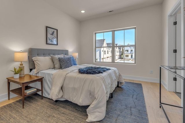 bedroom featuring light wood-type flooring