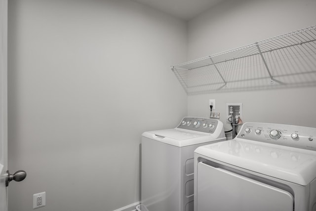 washroom with washer and clothes dryer