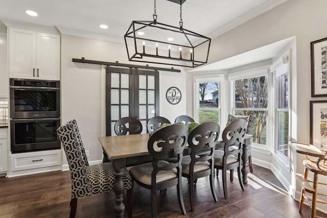 dining room with crown molding and dark wood-type flooring