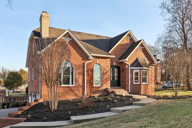 view of front of home with a front yard