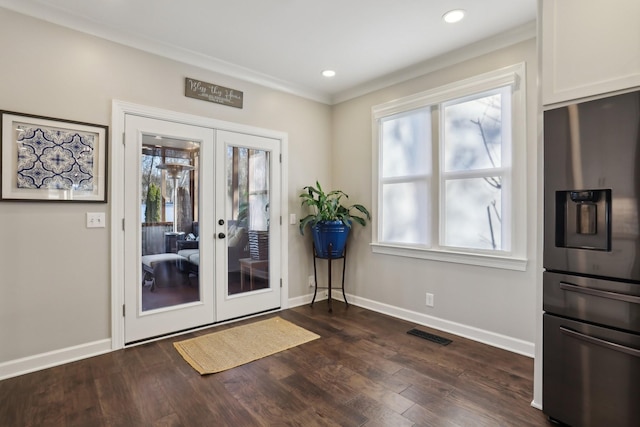 entryway featuring french doors and dark hardwood / wood-style floors