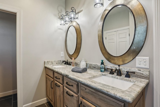 bathroom featuring vanity and tile patterned flooring