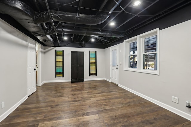 entrance foyer featuring dark wood-type flooring