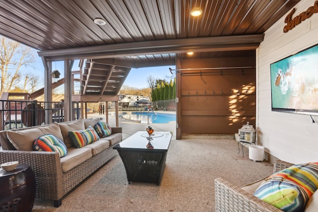 view of patio featuring an outdoor living space and a fenced in pool