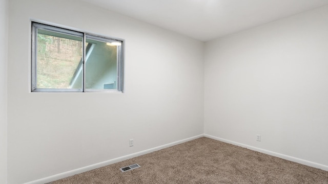 view of carpeted spare room