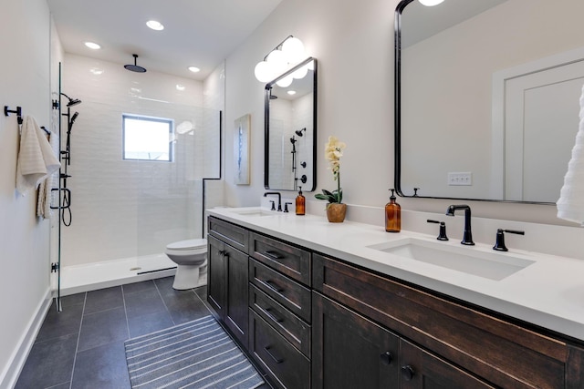 bathroom featuring vanity, an enclosed shower, tile patterned floors, and toilet