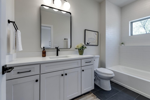 full bathroom featuring vanity, toilet, tub / shower combination, and tile patterned flooring