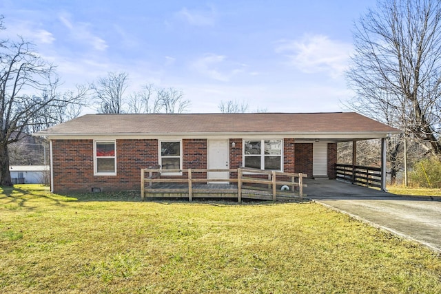 ranch-style home featuring a carport and a front yard