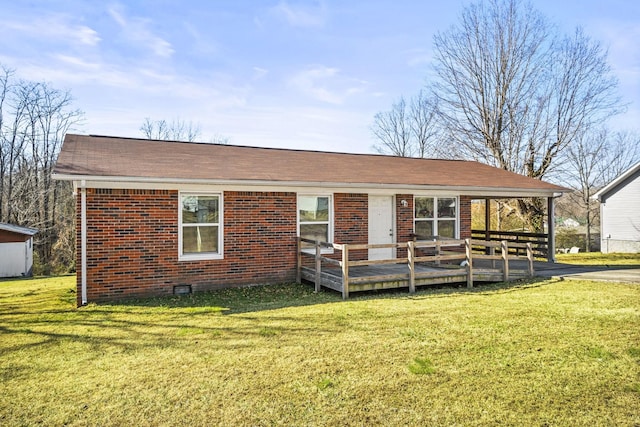 view of front of home with a wooden deck and a front yard