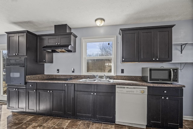 kitchen featuring sink, a textured ceiling, and black appliances