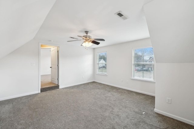 bonus room featuring vaulted ceiling, ceiling fan, and carpet