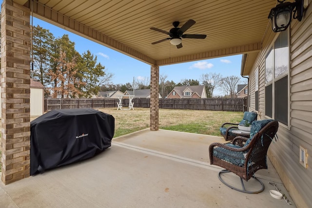 view of patio with grilling area and ceiling fan