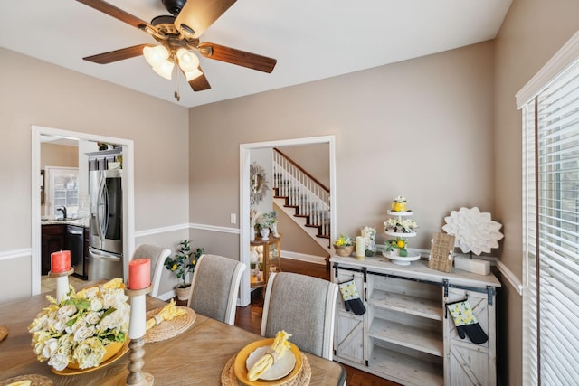 dining room featuring ceiling fan and hardwood / wood-style floors