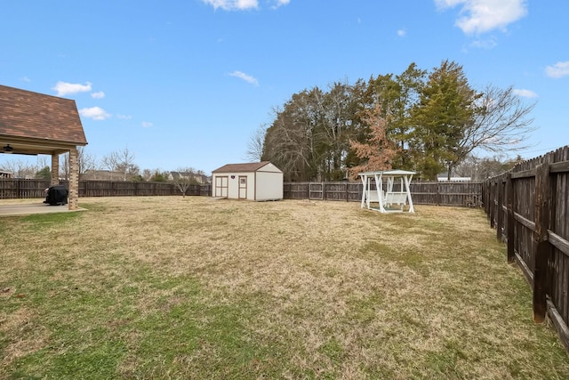 view of yard with a storage unit