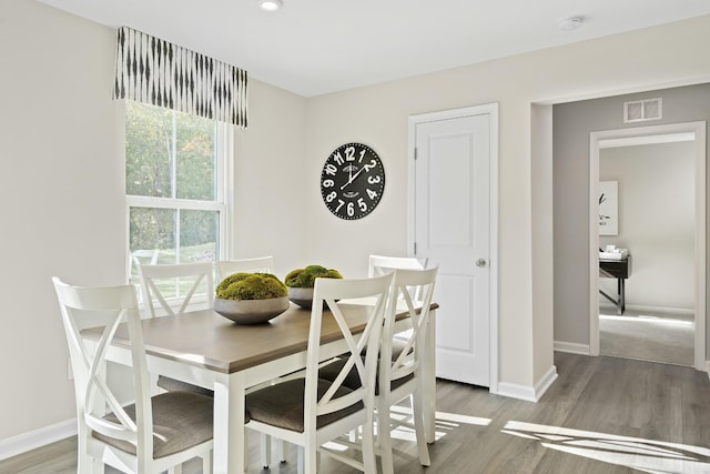 dining room featuring dark wood-type flooring