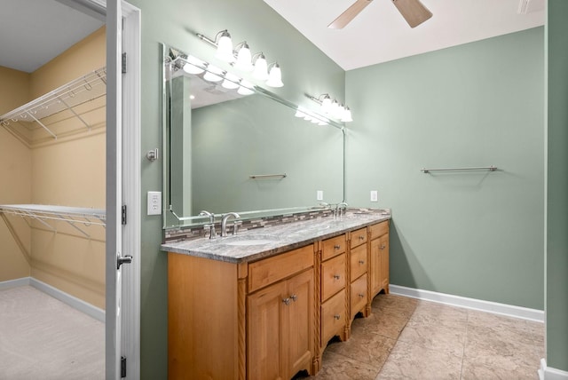 bathroom with vanity and ceiling fan