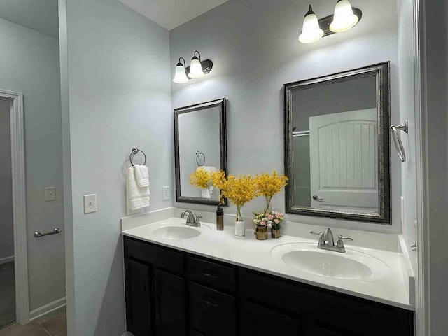 bathroom featuring vanity and tile patterned flooring