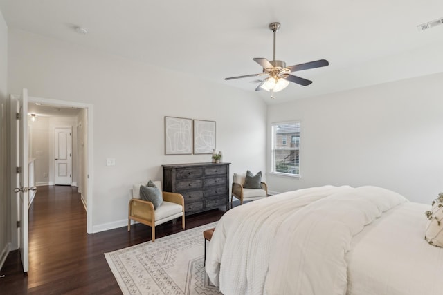 bedroom featuring dark hardwood / wood-style flooring and ceiling fan