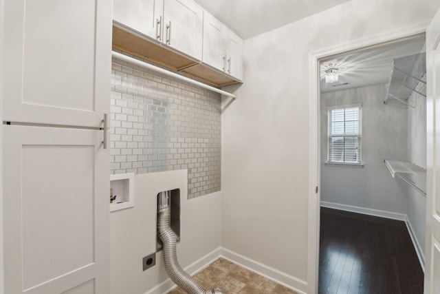 washroom with cabinets, electric dryer hookup, and washer hookup