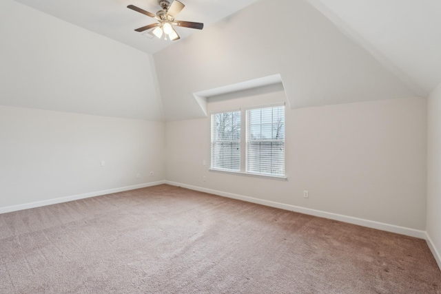 bonus room featuring ceiling fan, lofted ceiling, and carpet floors