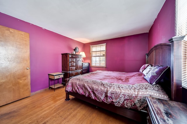 bedroom with light hardwood / wood-style floors