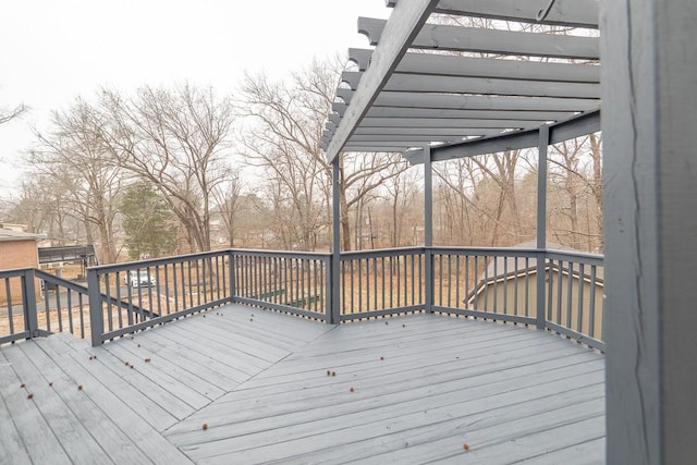 wooden deck with a pergola