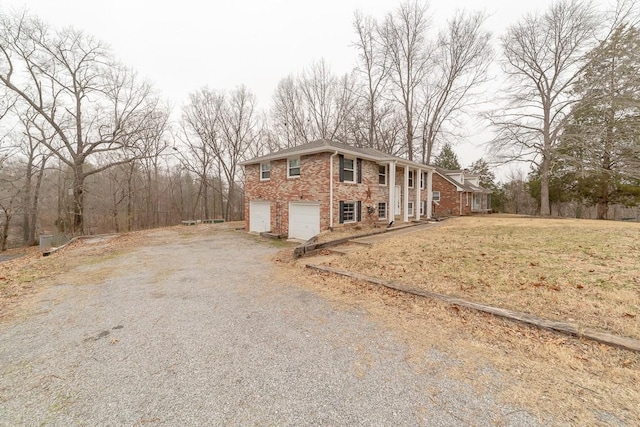 view of side of home featuring a garage