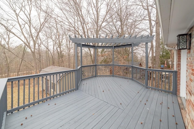 wooden terrace with a pergola