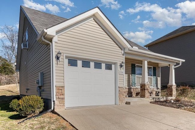 view of front of house with a garage and a porch