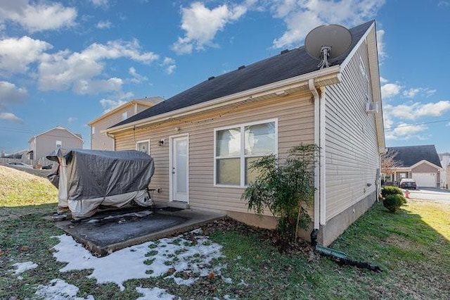 rear view of property with a patio