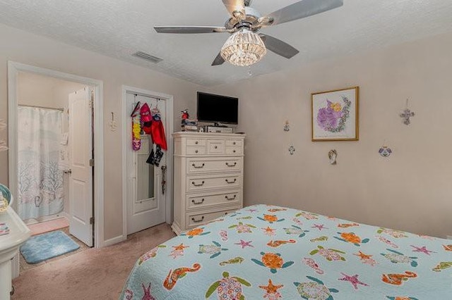 bedroom with light carpet, a textured ceiling, a closet, and ceiling fan