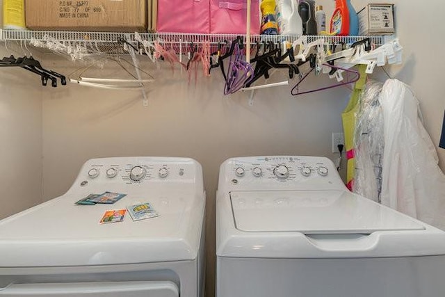 clothes washing area featuring washing machine and dryer