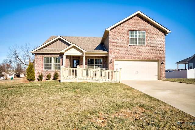 view of front facade featuring a garage, a front yard, and covered porch