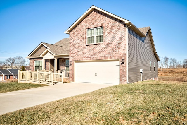 view of front property with a garage, a front lawn, and a porch