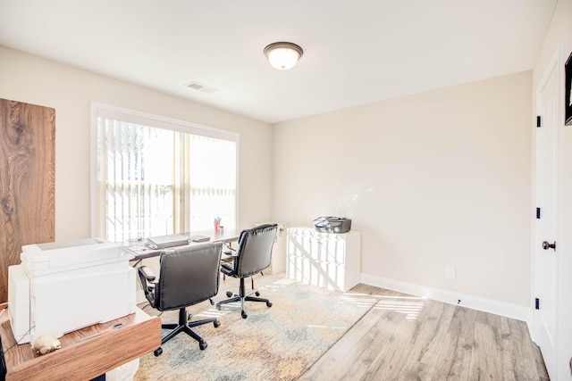 home office featuring light wood-type flooring