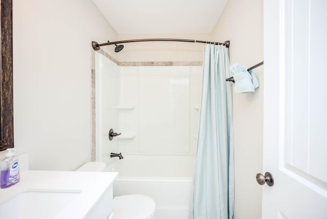 full bathroom featuring vanity, toilet, and shower / tub combo