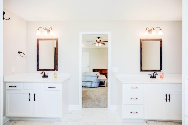 bathroom with ceiling fan and vanity