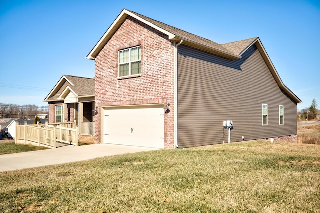 view of property exterior with a garage, a lawn, and a porch