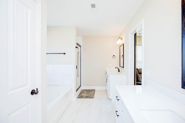 bathroom with vanity and plus walk in shower