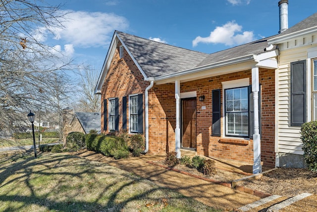 exterior space featuring a front lawn