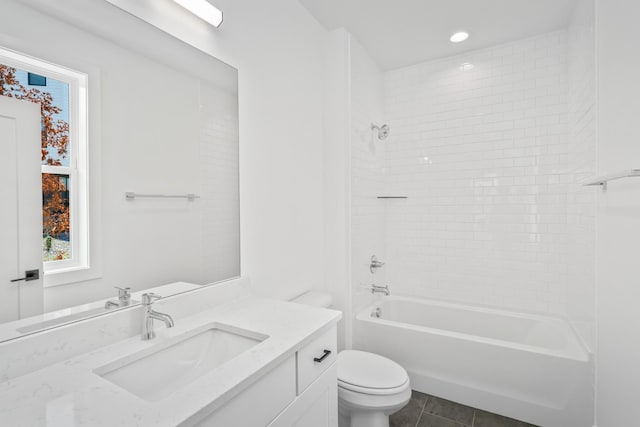 full bathroom featuring tile patterned flooring, vanity,  shower combination, and toilet