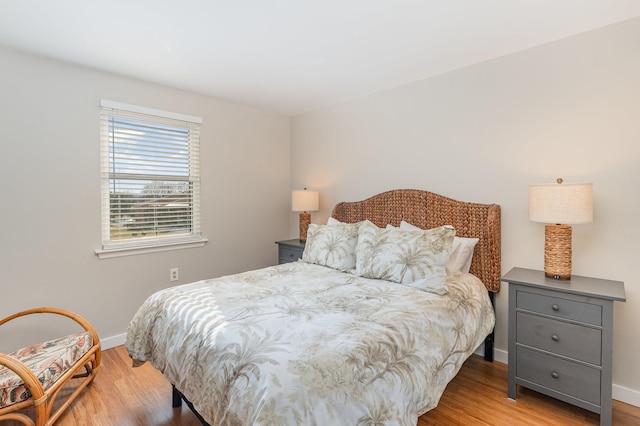 bedroom featuring light wood-type flooring