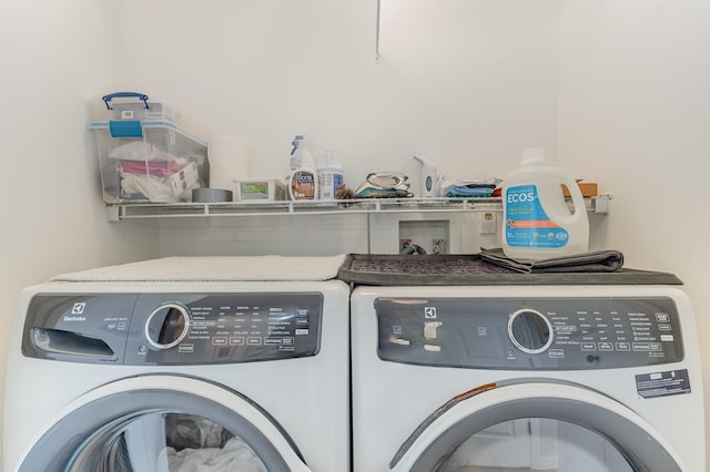 laundry area featuring independent washer and dryer