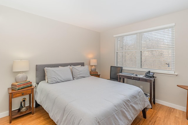 bedroom featuring light hardwood / wood-style flooring