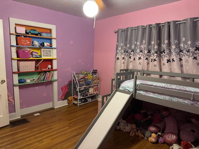 bedroom featuring dark hardwood / wood-style floors