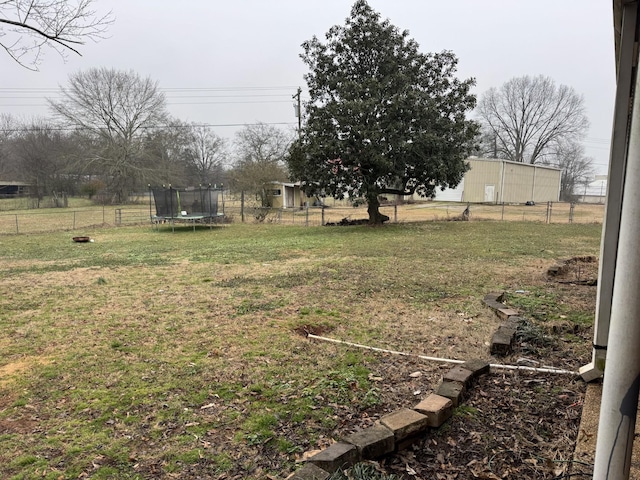 view of yard featuring a trampoline