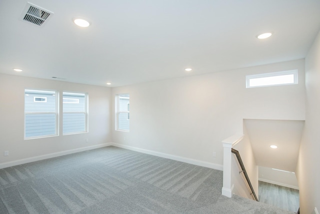 unfurnished room featuring carpet